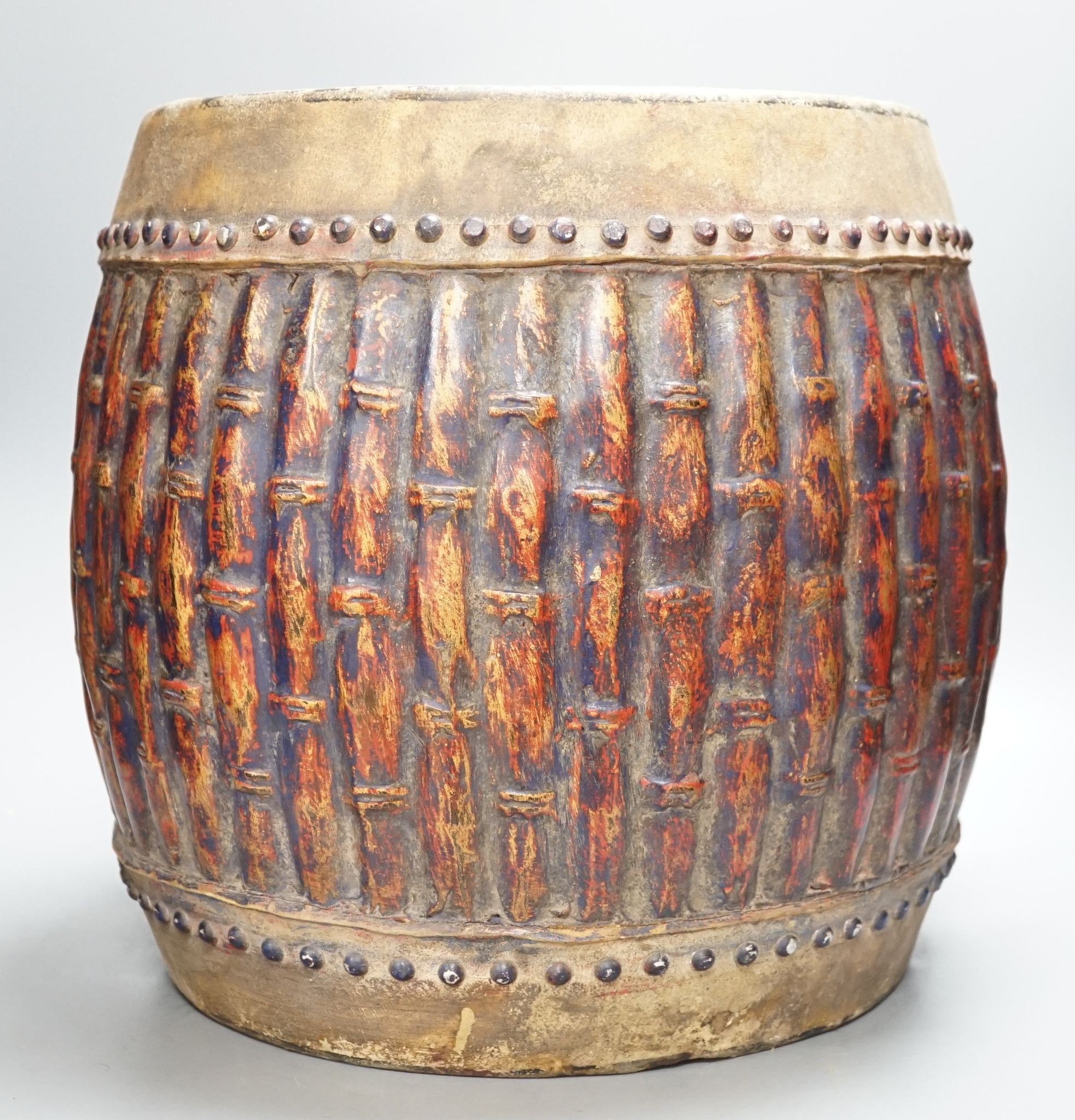 A Chinese bamboo-effect double sided temple drum, 37cm